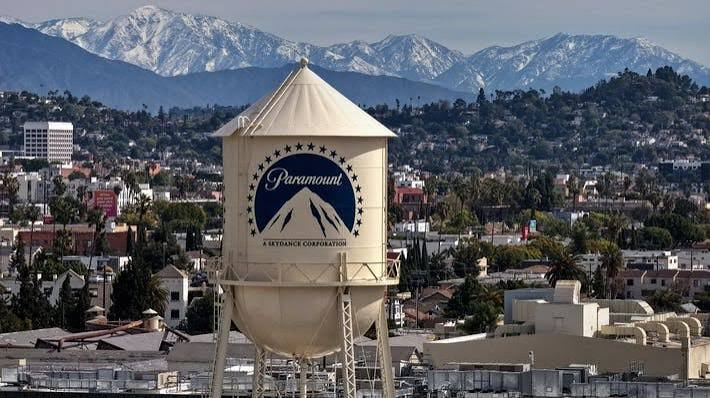 Paramount Studios water tower at dawn with Hollywood lot buildings