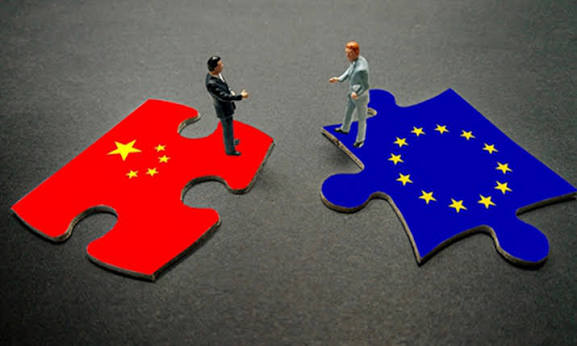 Chinese and EU flags fluttering against a sky