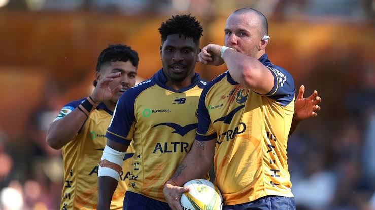 Western Force players celebrate lifting the Super Rugby AUS trophy