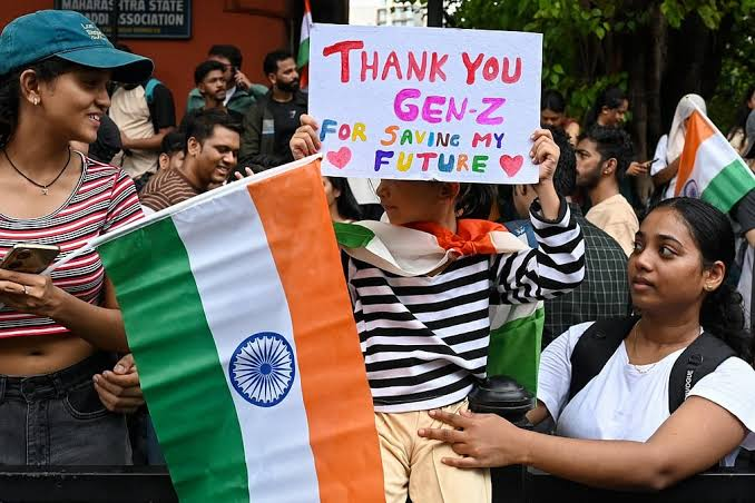 Students protesting at Jantar Mantar in New Delhi holding placards