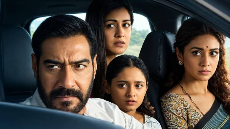 Ajay Devgn at Drishyam 3 promotions with packed cinema marquee