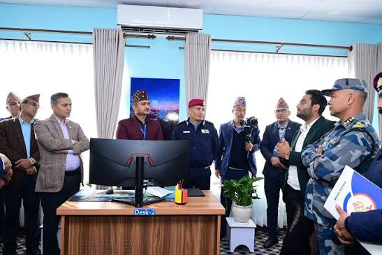 A conference room with police and industry delegates at Nepal Police Digital Action Dialogue discussing cybercrime.