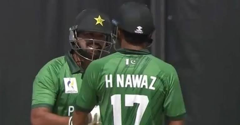 Pakistan cricketers celebrate a wicket at Korogi Sports Park, Nagoya
